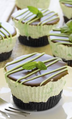 chocolate and mint tarts on a plate with a fork