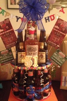 a birthday cake made out of beer bottles