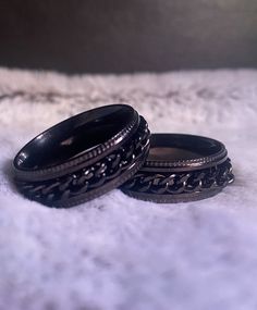 Black metal fidget rings with chain. These are perfect for all person that fidget, pick at their skin, pull/play with their hair, etc. There great to help stop negative habits/tendencies like skin picking.  I took one of the rings out of my stock and wear it all the time! I use to pick at my skin, break strands of hair, and chew on my pencil, this ring has helped me to put a stop to the negative habits! They are very durable, and las a very long time. Warning! Item will be shipped in a standard Spining Rings, Figet Rings, Figet Ring, Stim Jewelry, Negative Habits, Skateboard Rings, Fidget Jewelry, Skin Picking, Dark Earrings