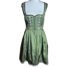 Kruger Green Satin Polka Dot Dirndl Dress, Eur 36 (Us 6) Euc! Green Satin With White Polka Dots. Gold Piping Trim Around Arm Holes. White Floral Trim Around Bust. Elegance Meets Tradition With This Dirndl From Krueger. This Fitted Dirndl Impresses With Its Fine Scattered Polk Dot Pattern, Which Gives The Dirndl A Wonderful Touch. A Zip At The Front Makes It Easy To Put On And Take Off. Sweetheart Neckline. The Sleeveless Design And Charming Trims Emphasize The Classic Look. The Skirt Reaches To Its Fine, Dirndl Dress, Stone Decor, Green Satin, Dots Pattern, White Polka Dot, Sweetheart Neckline, Classic Looks, Put On