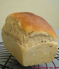 a loaf of bread sitting on top of a cooling rack