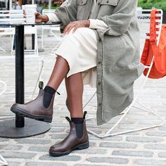 2116 is a women's vegan Chelsea Boot from Blundstone. Designed in Australia, in premium water-resistant vegan verified microfiber. This boot is lined with 100% breathable microfibre, thermo-regulating with antibacterial and microbial benefits. It contains a removable vegan verified footbed. A durable TPU outsole completes this lightweight and comfortable boot. This shoe runs true to size. Please choose the size you normally wear. Additional Feature: Iconic pull tabs. Blundstone Style, Blundstone Women, Chelsea Boots Outfit, Womens Casual Boots, Blundstone Boots, Brown Chelsea Boots, Botas Chelsea, Vegan Boots, Sheepskin Boots