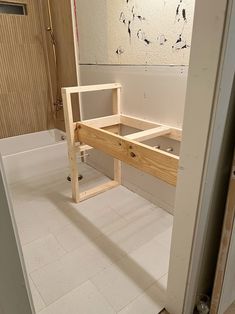 an unfinished bathroom with a bathtub and sink