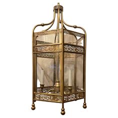 an ornately designed metal and glass display case