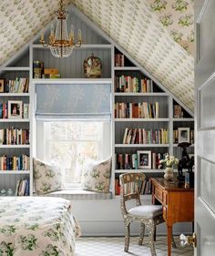 an image of a bedroom with bookshelves in it