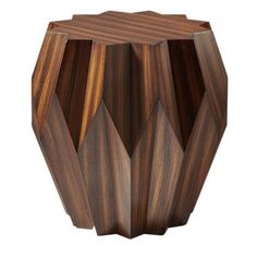 a wooden vase with geometric designs on it's sides and the top half in dark wood