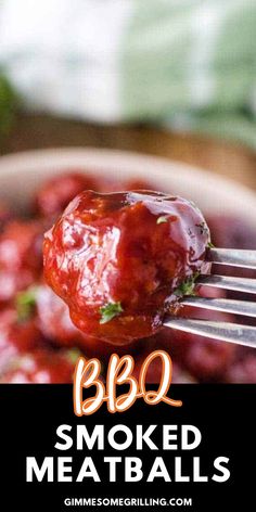 bbq smothered meatballs on a fork with text overlay that reads bbq smoked meatballs