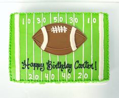 a birthday cake with a football on it