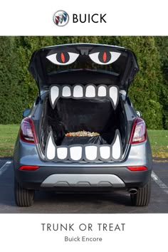 the trunk or treat car has eyes on it