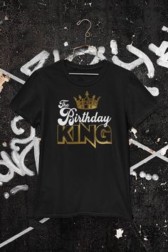 Visit our website (www.wilsondesigngrp.com) Looking for a unique and personalized birthday shirt for the man in your life? Look no further than Wilson Design Group's Birthday King Gold Shirt. Made with high-quality 100% cotton Gildan Brand fabric, this shirt is both comfortable and stylish. It's the perfect way to celebrate a birthday, vacation, or any special occasion. At Wilson Design Group, we take pride in delivering top-notch apparel and accessories, and our Birthday King Gold Shirt is no e Birthday King Tshirt, Deer Shirt, Birthday Squad Shirts, King Costume, King Shirt, Gold Shirt, 50th Birthday Shirts, Personalized Birthday Shirts, King Tshirt