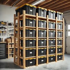 a large storage rack filled with lots of bins next to a wall full of tools