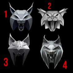 four different types of paper masks with the number one on each face and two demon's head