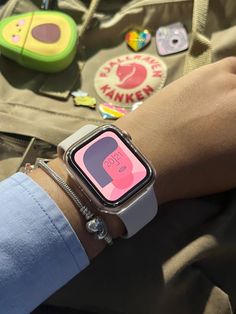 a person wearing an apple watch on their wrist