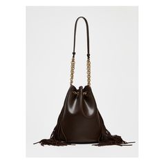 Shoulder bucket bag with cylindrical shape. Fringe detail at sides. Shoulder strap. Interior zip pocket. Ruched closure and magnetic button. Height x Length x Width: 9.8 x 8.1 x 5.9 inches (25 x 20.5 x 15 cm) Leather T Shirt, Kids Toy Store, Tas Bahu, Kids Skis, Hair Gift, Blazer With Jeans, Clean Laundry, Short Boots, Shirt Accessories