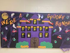 a bulletin board decorated with spooky bunches and halloween decorations on the front