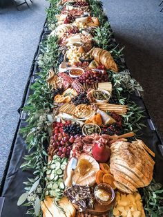 a long table filled with lots of different types of food