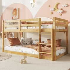 a child's bedroom with pink walls and wooden bunk beds