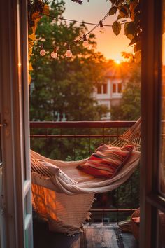 A cozy hammock on a small balcony with string lights, offering a serene sunset view, exemplifies small balcony design ideas. Balcony Design Ideas, Small Balcony Design, Tiny Space, Living Room Loft, Small Balcony, Balcony Design, Outdoor Retreat, Small Space Gardening, Balcony Decor