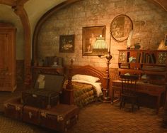 an old fashioned bedroom with suitcases on the floor