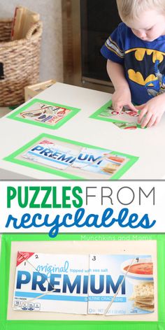 a young boy playing with puzzles from recycleables at the kitchen table