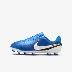 a blue and white soccer shoe on a white background