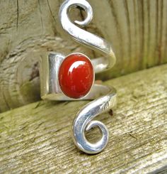 RING, STERLING SILVER, Handmade Statement Ring From Sterling Silver Fork , size 51/2 to 6 1/2, 8 x 10 mm Carnelian Cabochon ,High Polished . by McWilliamsBopArt on Etsy Handmade Adjustable Red Ruby Ring, Handmade Red Toe Ring, Adjustable Red Cabochon Jewelry, Fork Ring, Thumb Rings, Ring Sterling Silver, Statement Ring, Handmade Silver, Statement Rings