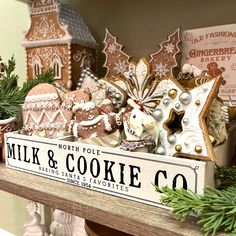 a shelf filled with lots of different types of cookies and other decorations on top of it