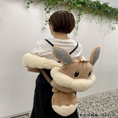 Get ready to catch 'em all with these limited edition Eevee backpacks! Perfect for any Pokémon fan, these fluffy plush backpacks from the Pokémon Center Japan feature a cute button and measure 83cm/32.6in. Don't miss out on this amazing addition to your collection. #Pokemon #Eevee #Backpack #LimitedEdition #PokemonCenterJapan Pokemon Themed Bedroom, Pokemon Bag, Pokemon Accessories, Pokemon Center, Pokemon Eevee, Plush Backpack, Catch Em All, Pokemon Fan, Animation Art