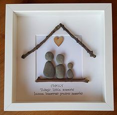 two rocks in a house shaped like a family