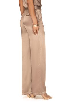 Make a casual-chic statement whether you're on or off the clock with these wide-leg pants made from lustrous satin. Zip fly with hook-and-bar closure Side-seam pockets; back welt pockets Lined 55% rayon, 45% viscose Hand wash, dry flat Imported Cream Formal Pants Outfit, High-waisted Satin Pants For Formal Occasions, Silk Wide Leg Pants Outfit, High-waisted Satin Wide Leg Pants For Evening, Elegant Beige Satin Bottoms, Casual Satin Wide-leg Pants, Wide Leg Pants Outfit Dressy, Satin Pants Outfit Casual, Fitted Satin High-waisted Wide Leg Pants