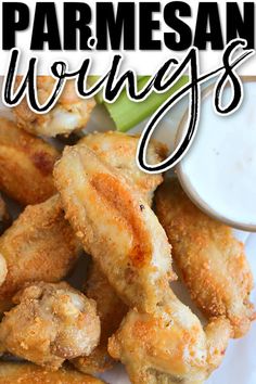 fried parmesan wings on a white plate with ranch dressing