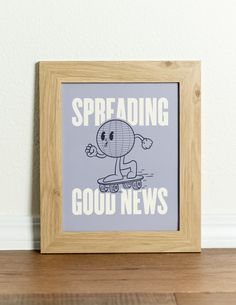 a wooden frame with an image of a cartoon character on the front saying spreading good news