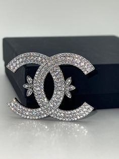 CoCo Brooch | Bijoux Royal | Affordable premium jewelry Channel Aesthetic, Sophie's Choice, Cc Brooch, Chanel Aesthetic, Designer Brooch, Coco Chanel Quotes, Coach Fashion, Premium Jewelry