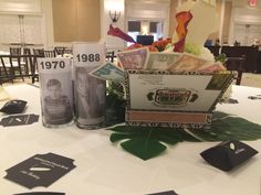 the table is set up for an event with place cards and other items on it