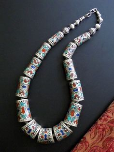 Nepal | Contemporary necklace handcrafted by Tibetan jewellery artistans living in exile in Nepal | Silver inlaid with turquoise, lapis lazuli and red coral | This necklace is a replica of older traditional pieces. Nepal Jewelry, Contemporary Necklace, Terracotta Jewellery, Tibetan Jewelry, Silver Jewellery Indian, Fantasy Closet, Sterling Necklaces, Oxidised Jewellery, Tube Beads