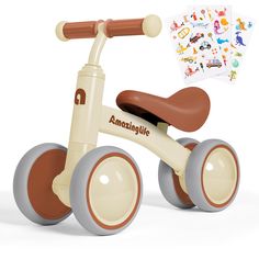 a wooden tricycle with stickers on the handlebars and wheels, in front of a white background