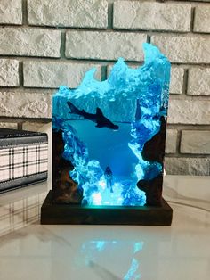 an iceberg is lit up on a table