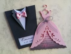 a card with a pink dress and bow tie next to a paper cutout that says congratulations