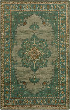 a green rug with an ornate design on the bottom and sides, in various colors