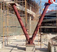 a large metal object sitting in the middle of a building under construction