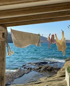 clothes hanging out to dry by the ocean