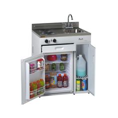 an open refrigerator with the door wide open and food in it's bottom compartment