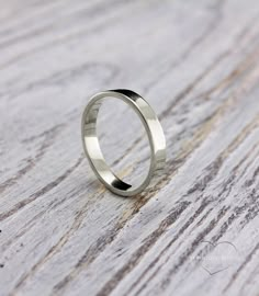 3mm simple silver band, Silver ring, Small silver band, Flat wedding band, Silver plain ring, Band for men for women, Sterling silver ring. ■ All wedding rings are only crafted with the finest of recycled metals DETAILS: Metal - Sterling Silver Dimensions - width 3mm (0.118 in.), thickness 1,3mm (0.05 in.) Finish - shiny (matte at your request) Please choose your ring size and finish in menu while making your order View similar simple wedding band with diamond: https://www.etsy.com/listing/51541 Simple Ring For Men, Engagement Rings Simple Men, Silver Ring Bands For Women, Simple Band Ring, Simple Silver Rings For Men, Simple Rings Men, Simple Ring Men, Simple Ring Design For Men, Simple Silver Band Ring