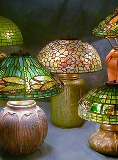 many different colored lamps sitting next to each other