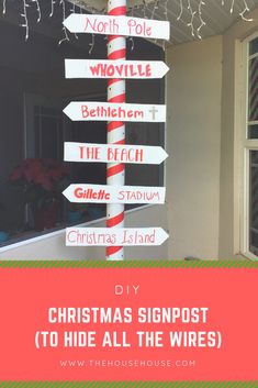 a pole that has signs on it with the words christmas signpost to hide all the wires