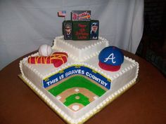 this is a baseball themed cake on a table