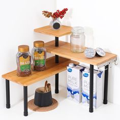 two wooden shelves with different items on them