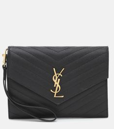 Cassandre matelassé leather clutch in black - Saint Laurent | Mytheresa Ysl Logo, Black Clutch, Classic Bags, Monogrammed Leather, Saint Laurent Bag, Leather Wristlet, Leather Pouch, Watch Collection, Leather Clutch