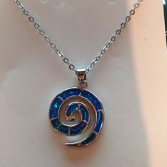 Silver And Sparkly Blue Spiral Necklace On 18 Inch Chain With 2 Inch Extender Brand New. Blue Spiral Sterling Silver Jewelry, Blue Spiral Necklace For Gift, Blue Spiral, Spiral Necklace, Spike Necklace, Unicorn Necklace, Statement Bib Necklace, Silver Bead Necklace, Purple Necklace