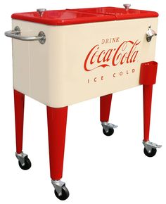 an old fashioned coca cola cooler on wheels